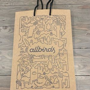 All birds shopping bag with sneaker lace tie string handles.